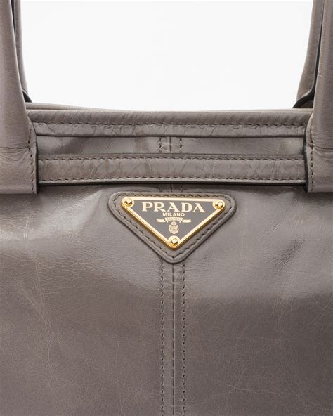 prada womens pebbled|Pewter Medium Leather Handbag .